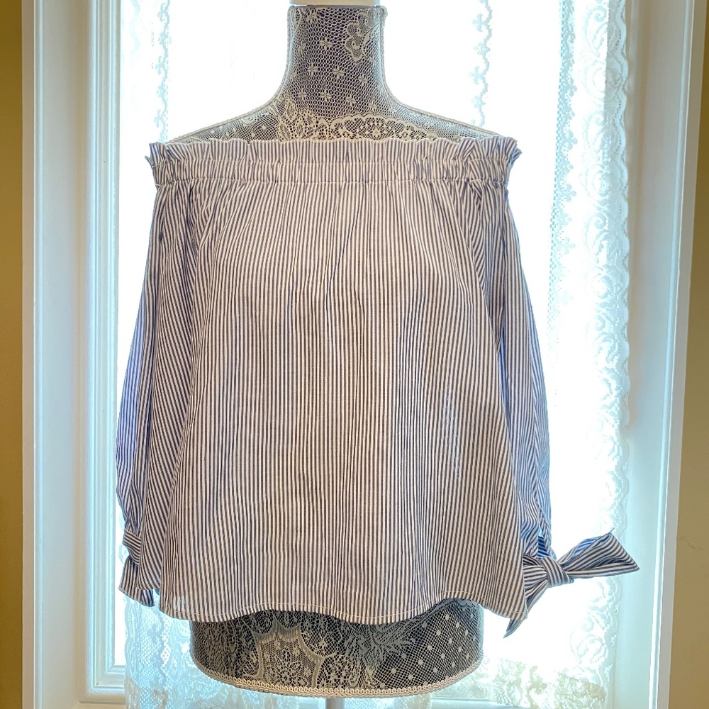 Striped off the-shoulder 3/4 sleeve with ties on cuff.